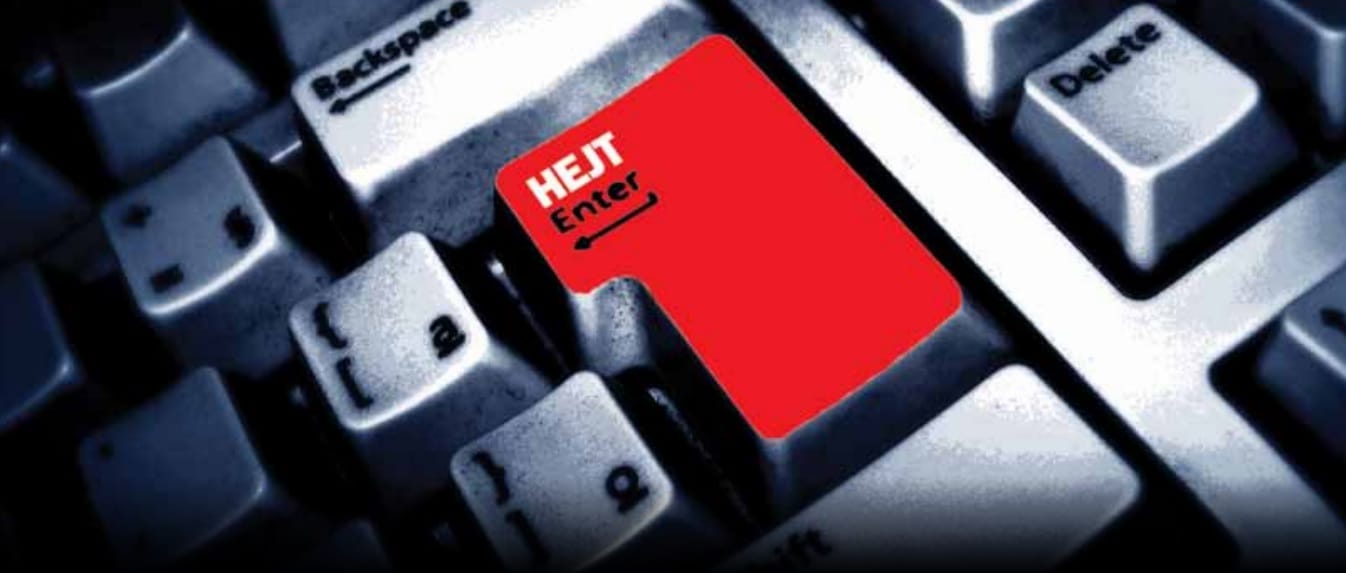 Czerwony klawisz Enter z nałożonym na klawiaturę napisem „HEJT”; naciśnij, aby kontynuować.