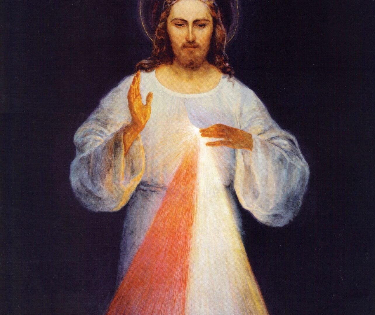 Obraz Jezusa Chrystusa Miłosiernego, promieniujący światłem i miłością.