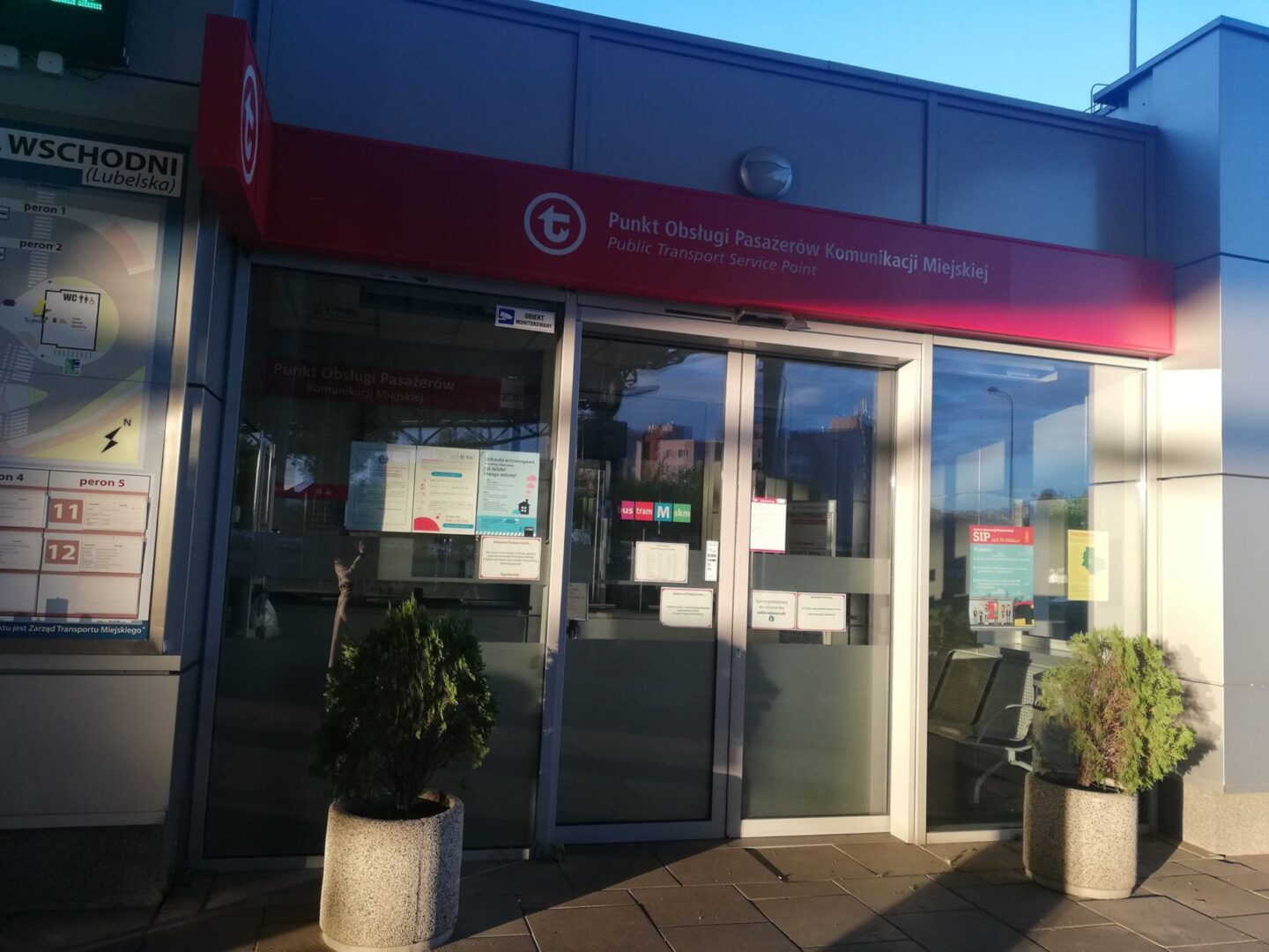 Public transport service point in Warsaw, Poland. "Punkt Obsługi Pasażerów Komunikacji Miejskiej" sign visible.