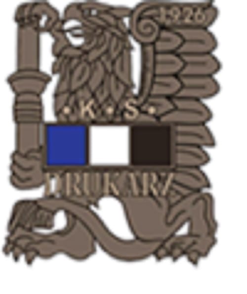 Godło Gryf z napisem „Drukarnia K.S. 1926” i tarczą niebiesko-biało-czarną