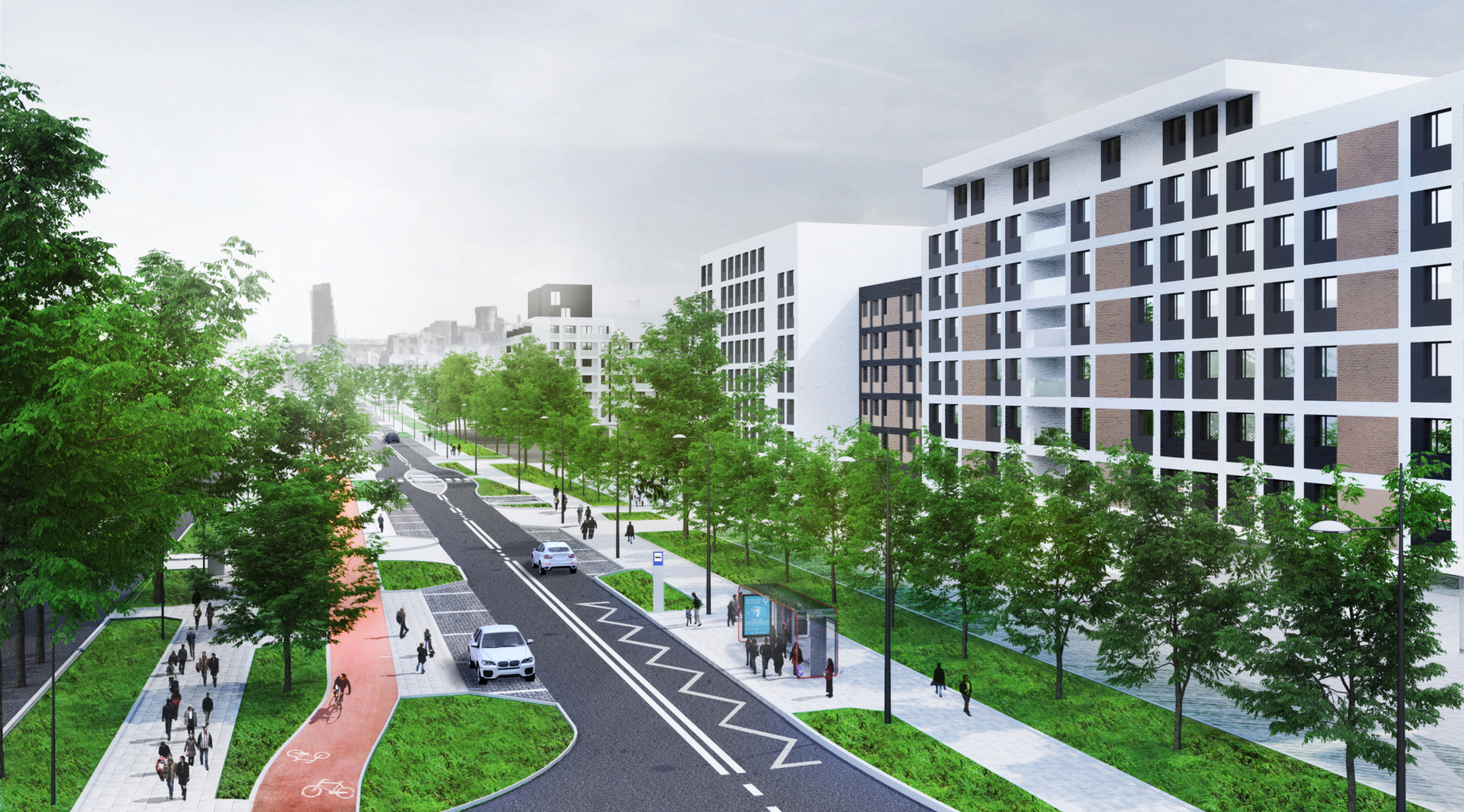 Nowoczesna ulica miejska ze ścieżkami rowerowymi, chodnikami dla pieszych i budynkami mieszkalnymi.