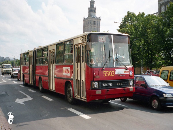 Czerwony i kremowy Jelcz 043 autobus nr 5503 na ulicy Warszawskiej
