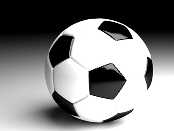 Zbliżenie klasycznej czarno-białej piłki nożnej.