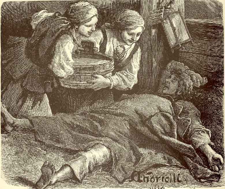 Dwie kobiety podają wodę choremu mężczyźnie leżącemu na ziemi.