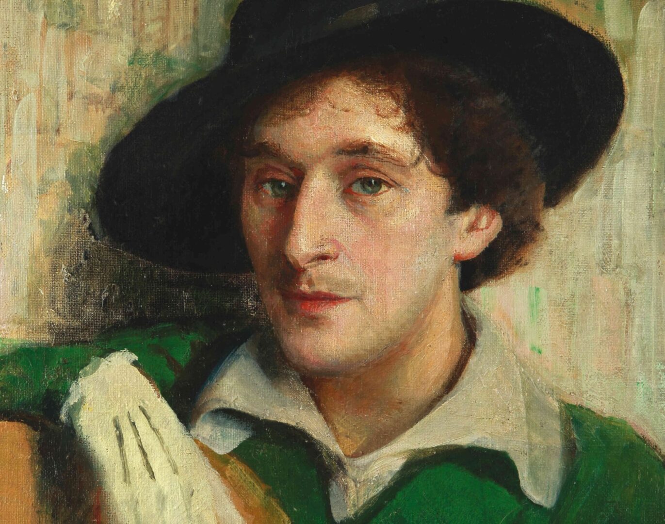 Portret młodego mężczyzny w zielonej kurtce i czarnym kapeluszu